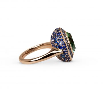 Flowerbud Ring: 8.64ct green tourmaline with blue sapphires in 18ct rose gold.                             