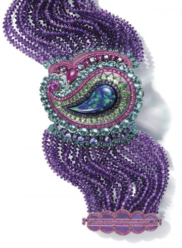 Chopard cuff composed of amethyst beads and set with topaz, rubies, tanzanites, purple sapphires, red and pink spinels, Paraiba tourmalines and a black opal