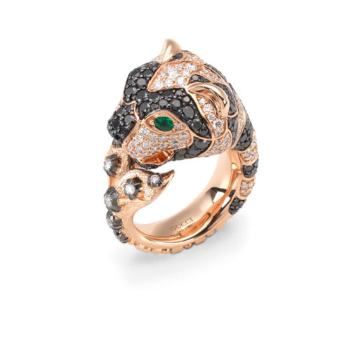 5. Gucci Tiger ring in gold with black and whit diamonds and emeralds