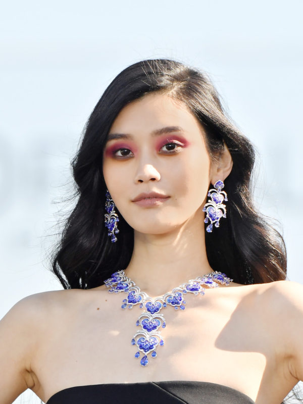 PARIS, FRANCE - SEPTEMBER 30:  Ming Xi walks the runway during Le Defile L'Oreal Paris as part of Paris Fashion Week Womenswear Spring/Summer 2019 on September 30, 2018 in Paris, France.  (Photo by Victor Boyko/Getty Images for L'Oreal Paris)